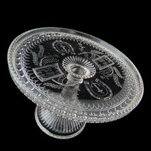 Load image into Gallery viewer, Close-up of Good Luck pattern on 1881 Adams Glass EAPG cake stand showing horseshoe and prayer rug symbols
