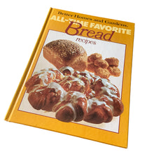 Load image into Gallery viewer, Better Homes and Gardens is known for its fabulous cookbooks. This hardcover cookbook focuses on All-Time Favorite Bread recipes. Its 96 pages are filled with amazing recipes along with many colour photographs. Originally published by Meredith Corporation, USA, 1979. This is the first edition, sixth printing, 1981.
In great vintage condition.