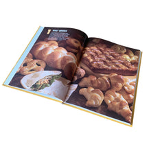 Load image into Gallery viewer, Better Homes and Gardens is known for its fabulous cookbooks. This hardcover cookbook focuses on All-Time Favorite Bread recipes. Its 96 pages are filled with amazing recipes along with many colour photographs. Originally published by Meredith Corporation, USA, 1979. This is the first edition, sixth printing, 1981.
In great vintage condition.