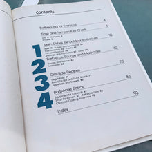 Load image into Gallery viewer, Better Homes and Gardens is known for its fabulous cookbooks. This hardcover cookbook focuses on their all time favourite barbecue inspired recipes. Its 96 pages are filled with amazing recipes along with many colour photographs. Originally published by Meredith Corporation, USA, 1977. This is the fourth printing 1984. In great vintage condition with normal age-related yellowing.