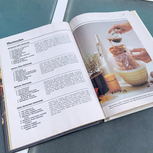 Load image into Gallery viewer, Better Homes and Gardens is known for its fabulous cookbooks. This hardcover cookbook focuses on their all time favourite barbecue inspired recipes. Its 96 pages are filled with amazing recipes along with many colour photographs. Originally published by Meredith Corporation, USA, 1977. This is the fourth printing 1984. In great vintage condition with normal age-related yellowing.
