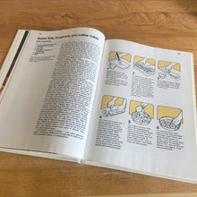 Load image into Gallery viewer, Better Homes and Gardens is known for its fabulous cookbooks. This hardcover cookbook focuses on All-Time Favourite Bread Recipes. Its 96 pages are filled with amazing recipes along with many colour photographs. Originally published by Meredith Corporation, USA, 1979. This is the fourth printing, 1985. In great vintage condition with normal age-related yellowing.