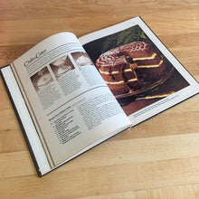 Load image into Gallery viewer, Better Homes and Gardens is known for its fabulous cookbooks. This hardcover cookbook focuses on All-Time Favourite Cake & Cookie Recipes. Its 96 pages are filled with amazing recipes along with many colour photographs. Originally published by Meredith Corporation, USA, 1980. This is the first edition printing. In great vintage condition with normal age-related yellowing.