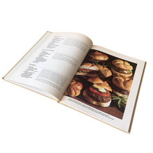 Load image into Gallery viewer, Better Homes and Gardens is known for its fabulous cookbooks. This hardcover cookbook focuses on All-Time Favorite Hamburger & Ground Meats recipes. Its 96 pages are filled with amazing recipes along with many colour photographs. Originally published by Meredith Corporation, USA, 1980. This is the first edition, fifth printing, 1981.
In great vintage condition.