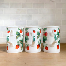 Load image into Gallery viewer, Handle view of three Roy Kirkham Alpine Strawberry bone china mugs. displaying red strawberry and green leaf pattern