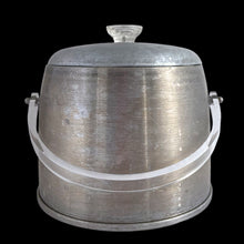 Load image into Gallery viewer, Vintage dome-shaped brushed aluminum ice bucket with clear lucite handle and knob. Crafted by Kromex, USA, 1950s. A fabulous example of mid-century design and style!
In used vintage condition with wear to the metal. The handle and knob are in excellent condition. Marked on the bottom, Kromex Enduringly Beautiful.
Measures 8 1/4 x 8 inches