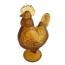 Load image into Gallery viewer, Vintage amber pressed glass standing rooster lidded candy dish #208. Crafted by Smith Glass, USA, 1907 - 2010. A fun piece to store treats, or use as farmhouse or cottage decor. In used vintage condition. There is roughness on the rims, but they could be from rough mold release, or they are flea bites. Measures 6 1/2 x 4 x 8 1/2 inches