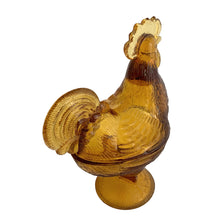 Load image into Gallery viewer, Vintage amber pressed glass standing rooster lidded candy dish #208. Crafted by Smith Glass, USA, 1907 - 2010. A fun piece to store treats, or use as farmhouse or cottage decor. In used vintage condition. There is roughness on the rims, but they could be from rough mold release, or they are flea bites. Measures 6 1/2 x 4 x 8 1/2 inches