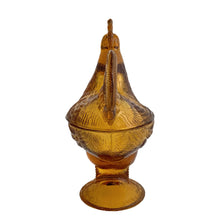Load image into Gallery viewer, Vintage amber pressed glass standing rooster lidded candy dish #208. Crafted by Smith Glass, USA, 1907 - 2010. A fun piece to store treats, or use as farmhouse or cottage decor. In used vintage condition. There is roughness on the rims, but they could be from rough mold release, or they are flea bites. Measures 6 1/2 x 4 x 8 1/2 inches