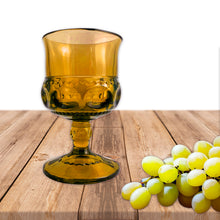 Load image into Gallery viewer, Vintage green "Crown" wine glasses. The vibrant green adds a retro touch to your tablescape. Crafted by Colony Glass, USA, between 1964 - 1967. These iconic glasses are perfect for entertaining! In excellent condition, free from chips. Measures 2 3/8 x 4 3/8 inches