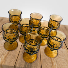 Load image into Gallery viewer, Vintage green "Crown" wine glasses. The vibrant green adds a retro touch to your tablescape. Crafted by Colony Glass, USA, between 1964 - 1967. These iconic glasses are perfect for entertaining! In excellent condition, free from chips. Measures 2 3/8 x 4 3/8 inches
