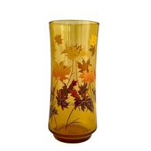 Load image into Gallery viewer, Vintage amber 16oz cooler glass tumbler decorated with maple leaves in brown, orange and yellow. Designed and crafted by the artisans at the Libbey Glass Company, USA, circa 1970s. You can almost taste the lemonade!
In excellent condition, free from chips/wear.
Measures 2 3/4 x 6 1/2 inches
Capacity 16 ounces
