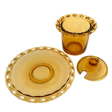 Load image into Gallery viewer, Vintage amber glass lidded marmalade jar and matching underplate both with elegant berry lace edge. Crafted by Rudolfova Glass, Czechoslovakia, 1950s. An lovely addition to your tableware collection, or to give as a gift with a jar of jam, marmalade or honey.
In very good condition, no chips, minor flea bites at the spoon hole.
Jar measures 3 1/2 x 4 inches, underplate 5 1/2 inches