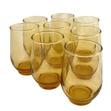 Load image into Gallery viewer, Set of 8 vintage amber Libbey Tempo juice glasses from a side angle showing depth and amber glass tone