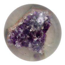 Load image into Gallery viewer, Overhead view of Tarax Infinity Products amethyst paperweight — raw crystal formation and lucite surface detail