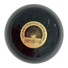 Load image into Gallery viewer, Base of Tarax Infinity Products lucite paperweight showing original maker's label, Canada, 1990s