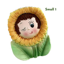 Load image into Gallery viewer, Set of three vintage mid-century era, hand painted anthropomorphic sunflower face ceramic wall pockets. Crafted by PY, Japan, 1950s. A must-have for any home decor collector, this charming and highly sought-after set is sure to add a touch of kitschy cuteness to your space.
In good vintage condition with minor wear to the top of the sunflowers and rim and a tiny chip on the large one, see photos.
Large measures 5 x 1 3/4 x 7 inches
Two small measures 3 1/2 x 1 3/8 x 4 3/4 inches