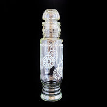 Load image into Gallery viewer, Vintage mid-century clear glass apothecary jar featuring a design of pale blue and white clock or watch pendants. Maker unknown. This versatile jar may be used to store food items in the kitchen, or vanity items in the bath. In excellent condition, free from chips/wear. Measures 2 1/2 x 11 inches