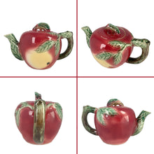 Load image into Gallery viewer, Rare Find! Sweet vintage mid-century era majolica style figural apple shaped ceramics, including a teapot, creamer and covered sugar featuring brown branch handles and green leaves. Crafted by Metroware, Japan, circa 1940s. Perfect to add kitsch style to your kitchen decor. In excellent used vintage condition, free from chips, with interior staining and crazing. Measures 8 1/2 x 4 3/4 x 5 3/4 inches