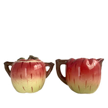 Load image into Gallery viewer, Adorable hand painted anthropomorphic apple face creamer and covered sugar. Crafted by PY, Japan, 1950s. A sweet mid-century kitschy set makes a great addition to your ceramics collection and kitchen decor!
In excellent vintage condition, no chips/cracks, normal crazing present.
Creamer measures 3 3/4 x 3 1/4 inches
Sugar measures 3 1/4 x 3 3/8 inches