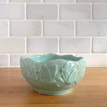 Load image into Gallery viewer, Vintage Art Deco matte aqua glazed Butterfly Line console bowl. Crafted by Nelson McCoy Pottery, early 1940s. This rare piece is must for any McCoy art pottery collector!
In excellent vintage condition, no chips/cracks/repairs. Unmarked.
Measures 10 1/4 x 8 1/8 x 6 1/2 inches
