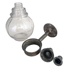 Load image into Gallery viewer, Vintage Art Deco glass globe wall-mounted cast metal industrial soap dispenser. These were typically found in classic bathrooms, gas stations, or public lavatories in the early to mid-20th century. This dispenser adds historical charm to farmhouse, industrial, or authentic restorations.
In as found used vintage condition, no chips in the glass, metal bracket shows patina and age-related wear. Requires restoration.
Measures 5 3/4 inches tall and extends 5 3/4 inches from the wall. Globe 3 1/2 inches
