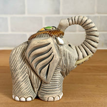 Load image into Gallery viewer, Artesania Rinconada elephant figurine number 9 vintage Uruguay art pottery opposite side view showing body texture with glazed brown ribbed saddle collectible figurine