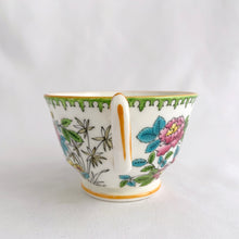Load image into Gallery viewer, Vintage hand painted, multi-colour Asian rose flowered teacup in the Chinoiserie style is a rare pattern produced by Hammersley and Company, Bone China, England, circa 1940s. Painted in the interior and exterior, the flowers are shades of blue, pink, yellow and green featuring a pair of scrolls tied with a pink bow. Makes a lovely gift for any occasion. Excellent condition, free from chips, cracks or repairs. Teacup measures3 1/2 x 2 1/4 inches. Saucer measures 5 1/4 inches