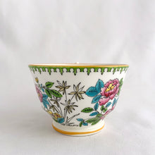 Load image into Gallery viewer, Vintage hand painted, multi-colour Asian rose flowered teacup in the Chinoiserie style is a rare pattern produced by Hammersley and Company, Bone China, England, circa 1940s. Painted in the interior and exterior, the flowers are shades of blue, pink, yellow and green featuring a pair of scrolls tied with a pink bow. Makes a lovely gift for any occasion. Excellent condition, free from chips, cracks or repairs. Teacup measures3 1/2 x 2 1/4 inches. Saucer measures 5 1/4 inches