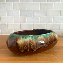 Load image into Gallery viewer, Vintage glossy aurora drip glaze oval ceramic planter. Crafted by Robinson Ransbottom Pottery Co., USA, 1960s. A beautiful piece to add to your art pottery collection and plant up your favourite succulents or houseplant!
In excellent condition, no chips/cracks/repairs. Maker's marks.
Measures 9 x 5 3/4 x 2 3/4 inches