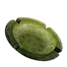 Load image into Gallery viewer, Angled top view of Anchor Hocking Avocado green Soreno glass ashtray, bark texture, four cigarette rests