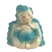 Load image into Gallery viewer, Vintage baby boy ceramic planter, shape 92. This sweet planter features a baby boy in blue diaper holding a rattle, leaning against a blue ruffled edged pillow. Crafted by Hull Pottery, USA, 1950s. Perfect for a houseplant or to use as nursery decor or as a practical holder for baby's accessories. In excellent condition, no chips. Measures 5 1/4 x 4 1/2 x 5 1/2 inches