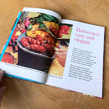 Load image into Gallery viewer, Better Homes and Gardens is known for its fabulous cookbooks. This hardcover cookbook focuses on barbeque and picnic inspired recipes. Its 61 pages are filled with amazing recipes along with many colour photographs. Originally published by Meredith Corporation, USA, 1963. This is the first edition. In great vintage condition with normal age-related yellowing.