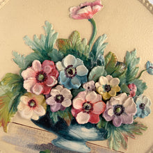 Load image into Gallery viewer, This exquisite vintage round Barbola wall plaque, adorned with a still life of anemone flowers in a blue vase set against a creamy backdrop, this charming artwork is signed by its talented artist, L. Braithwaite, and dates back to the 1930s. Bring a touch of cottage charm to your decor with this stunning piece. In good vintage condition. Some cracking present commensurate with age, see photos. Measures 11 3/4 inches