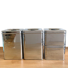 Load image into Gallery viewer, Opposite side view of Vintage Lincoln BeautyWare 4-piece chrome kitchen canister set, embossed Flour Sugar Coffee Tea lettering, ribbed steel, 1940s USA