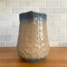 Load image into Gallery viewer, Vintage art deco gloss beige blue fade ceramic yellow ware pitcher featuring climbing roses on a trellis pattern. Crafted by McCoy Pottery, USA, 1920s. A beautiful piece to add to your art pottery collection!
In excellent condition, no chips/cracks/repairs, age-related crazing. Typical manufacturing glaze pops. Unmarked.
Measures 7 x 7 7/8 inches incl. handle
