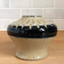 Load image into Gallery viewer, Bennett signed studio pottery vase, straight-on front view — wide squat body on flared foot, deep cobalt glaze band, hand-carved cream sunburst ribs radiating from narrow neck