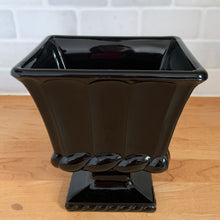 Load image into Gallery viewer, LE Smith black amethyst glass pedestal planter, straight-on front view looking into open rim, showing smooth interior, fluted body, rope-twist collar, and square pedestal base