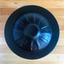 Load image into Gallery viewer, This vintage figural ceramic black pot belly stove cookie jar was crafted by McCoy Pottery in the 1960s. It's a must-have for any McCoy collector looking to add charm to their vintage cottage or farmhouse kitchen decor. This cookie jar is a perfect example of McCoy's expertise in creating high-quality and timeless pieces.
In excellent condition, no chip/cracks/repairs. There are a few tiny spots of glaze misses/loss.
Measures 6 3/4 x 7 x 10 3/8 inches