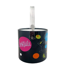 Load image into Gallery viewer, Fabulous vintage black ice bucket featuring colourful cocktail graphics, complemented by a clear lucite lid and handle with white lining and knob. Made in Taiwan, 1970s. Add the fun factor to your retro barware collection!
The bucket is in great vintage condition with minor wear, see photos.
Measures 7 1/2 x 8 1/2 inches (12 1/4 with handle extended)