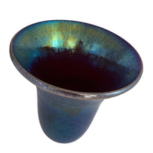 Load image into Gallery viewer, Beautiful vintage hand blown Egyptian lustre black amethyst stretch art glass vase. The iridescence on this piece is stunning!  In excellent condition, no chips. Signed by the artist Raymond D. Matthews Jr.,  Bittersweet Glassworks mid 1970s.  Measures 6 1/4 x 6 3/4 inches