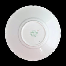 Load image into Gallery viewer, This lovely vintage art deco style bone china teacup and saucer features a pale blue exterior and gold gilt details with subtle scalloped rims. The cup's white interior and centre of the saucer, each display a hand painted bouquet of pink roses and colourful flowers. Crafted by Royal Grafton, England, 1950s. A lovely way to enjoy a cuppa tea!
In excellent condition, no chips, cracks or repairs. Maker's mark on the bottom.
Teacup measures 3 1/2 x 3 inches. Saucer measures 5 3/8 inches