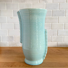 Load image into Gallery viewer, Front view of vintage Brentleigh Ware Art Deco celadon blue gloss glazed ceramic vase showing ribbed vertical handle detail and flared rim