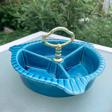 Load image into Gallery viewer, Vintage 3-part handled dish belonging to lazy susan set centrepiece, shape L65. Crafted by California Pottery, USA, circa 1950s. Works beautifully as a stand-alone serving piece for nuts, candies or your favourite snacks.
In excellent condition, no chips/cracks.
Measures 7 1/2 x 3 3/4 inches (incl. handles)