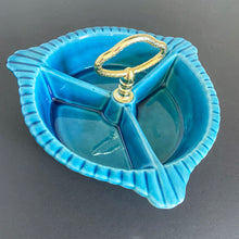 Load image into Gallery viewer, Vintage 3-part handled dish belonging to lazy susan set centrepiece, shape L65. Crafted by California Pottery, USA, circa 1950s. Works beautifully as a stand-alone serving piece for nuts, candies or your favourite snacks.
In excellent condition, no chips/cracks.
Measures 7 1/2 x 3 3/4 inches (incl. handles)