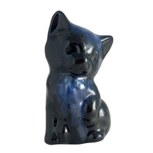Load image into Gallery viewer, Charming vintage redware cat figurine finished in blue drip glaze. Crafted by the artists of Blue Mountain Pottery in the 1970s. This nostaligc piece of Canadian craftsmanship is the purr-fect addition to your art pottery collection.
Excellent condition, no chips, cracks or repairs. Unmarked.
Measures 3 x 2 3/4 x 5 1/2 inches