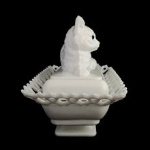 Load image into Gallery viewer, Gorgeous vintage white cat-on-nest milk glass dish featuring a lovely lace edge and blue glass eyes. Crafted by Westmoreland Glass, USA, circa 1950s/60s. A unique piece of pressed glass to use as a candy dish or catchall. A wonderful gift for the vintage glass enthusiast or cat lover!
In excellent condition, no chips, cracks or repairs. Lid and base have Westmoreland's maker's mark.
Measures 8 1/8 x 5 1/8 x 6 inches