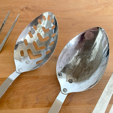 Load image into Gallery viewer, Close-up of stainless steel slotted spoon and solid spoon bowls from vintage Japanese kitchen utensil set, showing age wear and patina
