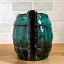 Load image into Gallery viewer, Handle view detail of the barrel mug in green drip glaze