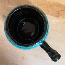 Load image into Gallery viewer, Overhead view of the barrel mug in, showing the interior and rim